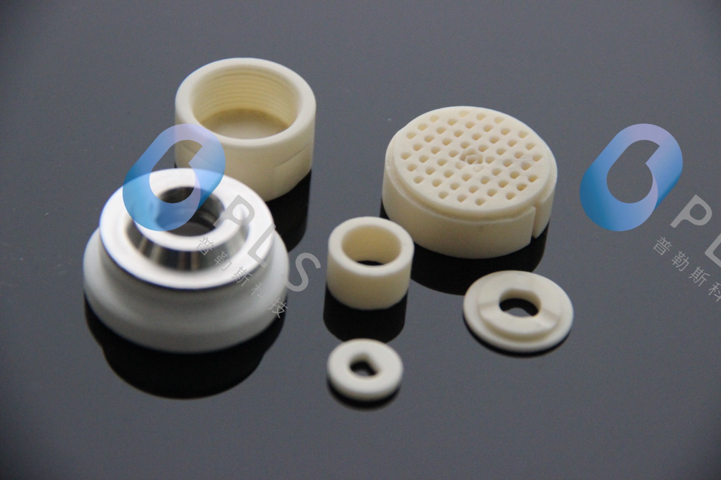 Specialty ceramic components on a graphite surface